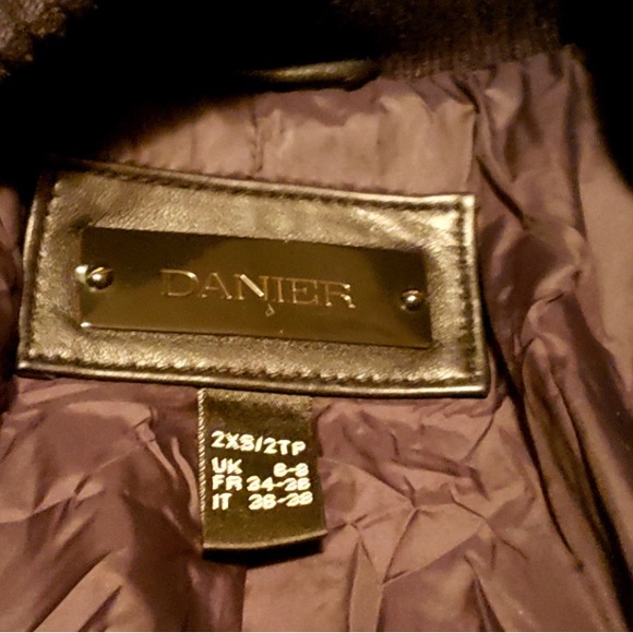 Danier Winter Leather Coat Size 4-6
Black Fitted Leather coat. - Picture 2 of 3